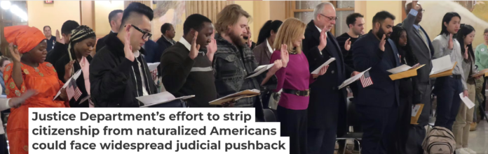 Dozens of immigrants from 18 nations take the oath to become U.S. citizens on Jan. 27, 2025, in Topeka, Kan. AP Photo/John Hanna